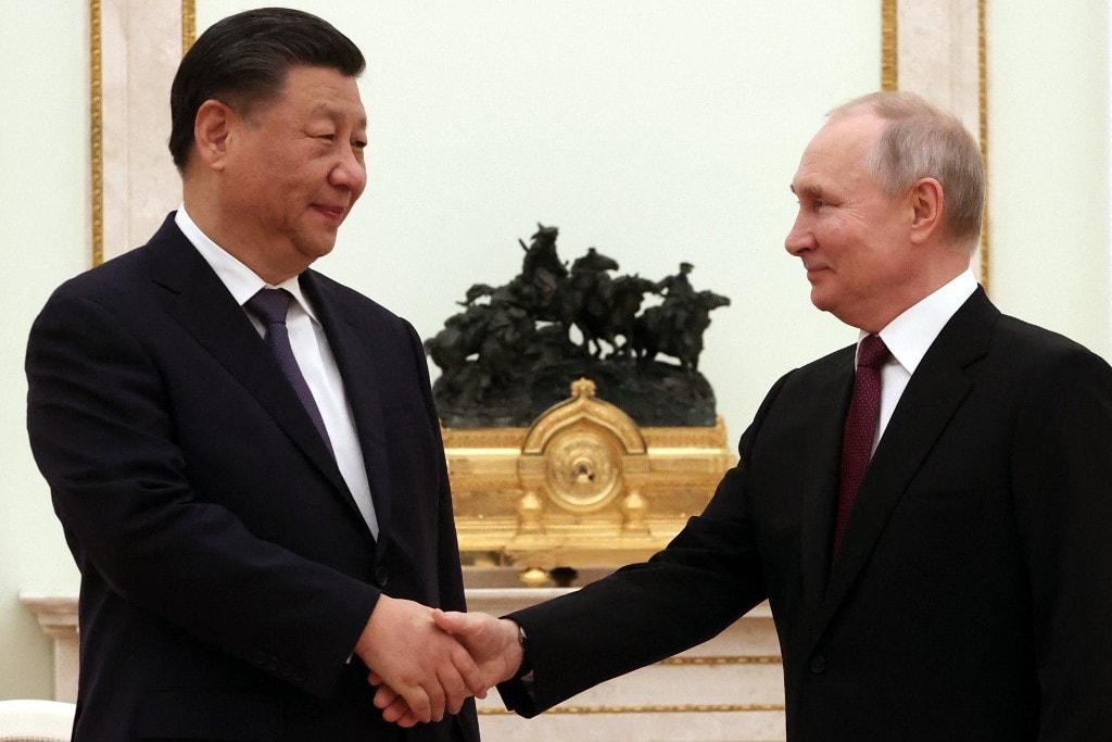 Putyin szerint Moszkva tisztelettel viszonyul Peking rendezési tervéhez