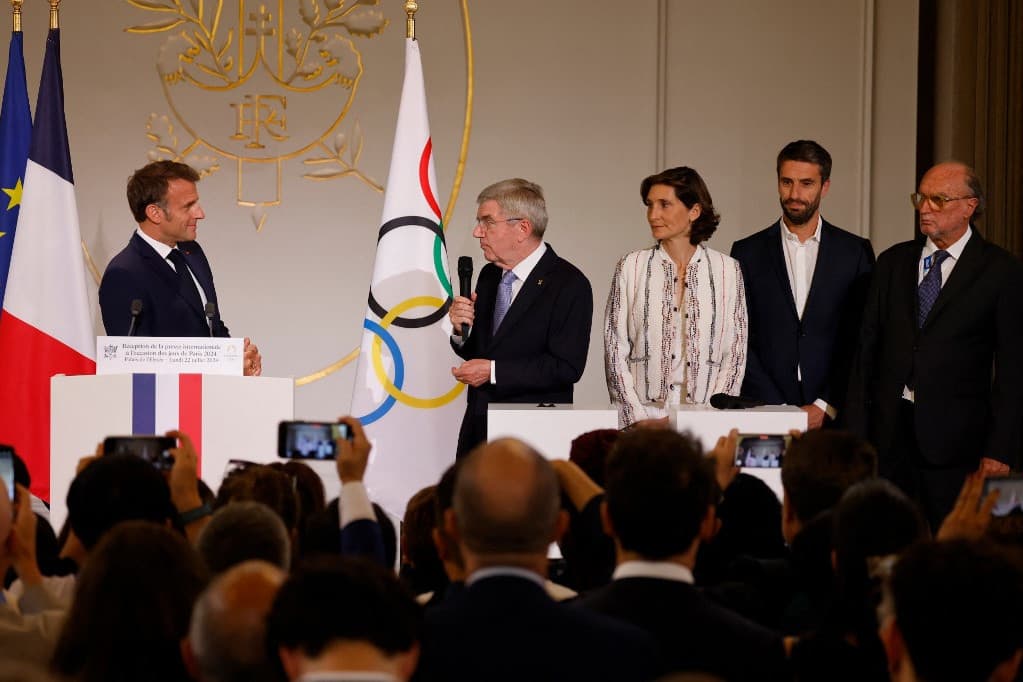 A francia elnök és NOB vezetője az Elysée-palotában köszöntötte a nemzetközi sajtót